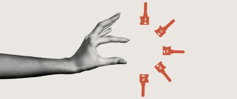 A black and white hand reaches toward five red illustrated keys. 