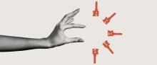 A black and white hand reaches toward five red illustrated keys. 